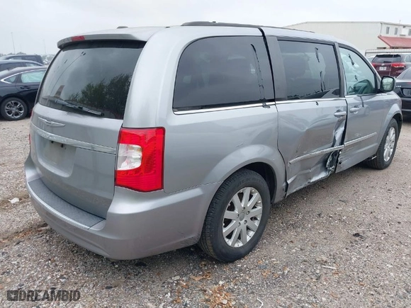 2014 Chrysler Town & Country Touring with VIN 2C4RC1BG1ER345601, listed as a IAAI auction lot 41916135 with 194,691 mi miles. Bid and sale history available at carsss.com. Image 4.