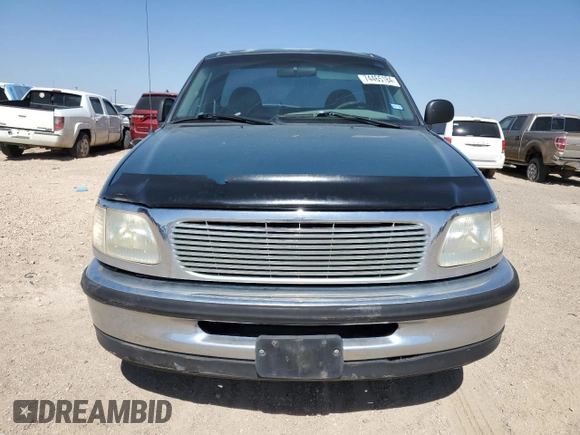 1997 Ford F-150 z VIN 1FTDF1728VNA87864, wystawiony jako Copart lot #74465184 z przebiegiem 205 501 mil mil oraz Szkoda całkowita • Salvage title. Historia ofert i sprzedaży dostępna na DreamBid. Obrazek 5.