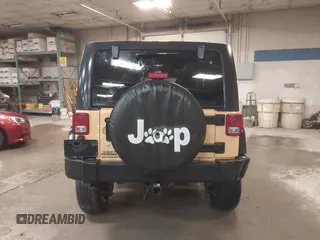 2014 Jeep Wrangler Unlimited Sport with VIN 1C4BJWDG2EL134143, listed as a IAAI auction lot 41957046 with 151,529 mi miles and . Bid and sale history available at DreamBid. Image 17.