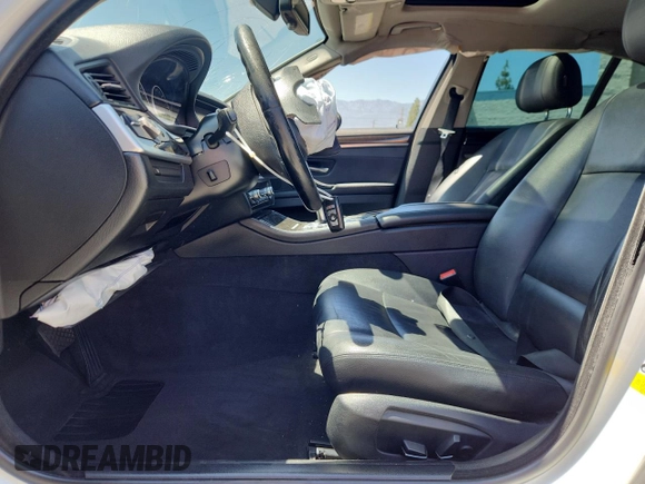 2015 BMW 5 Series 528i with VIN WBA5A5C59FD518341, listed as a Copart auction lot 63881785 with 147,489 mi miles and Salvage title. Bid and sale history available at DreamBid. Image 7.