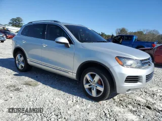 2011 Volkswagen Touareg Sport with VIN WVGFF9BPXBD000778, listed as a Copart auction lot 48529305 with 84,013 mi miles and Non Repairable. Bid and sale history available at DreamBid. Image 4.