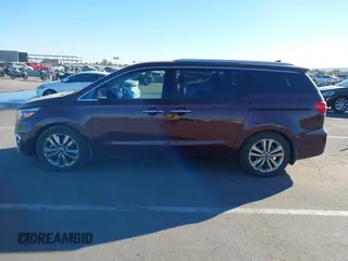 2015 Kia Sedona SX-L with VIN KNDME5C15F6046322, listed as a IAAI auction lot 41301459 with 76,026 mi miles and . Bid and sale history available at DreamBid. Image 14.