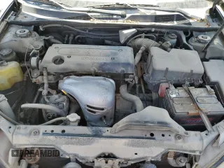 2002 Toyota Camry LE z VIN JTDBE32K120068644, wystawiony jako Copart lot #61168915 z przebiegiem 210 149 mil mil oraz Czysty tytuł • Clean title. Historia ofert i sprzedaży dostępna na DreamBid. Obrazek 11.