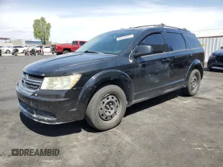 2014 Dodge Journey American Value with VIN 3C4PDCAB1ET267226, listed as a Copart auction lot 62222475 with 125,603 mi miles and Clean title. Bid and sale history available at DreamBid. Image 1.