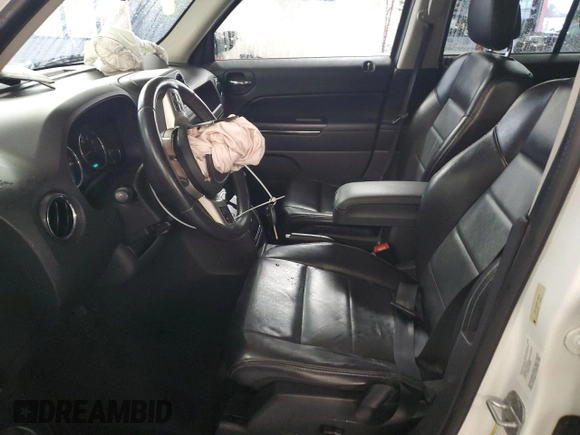 2011 Jeep Patriot Latitude X with VIN 1J4NF4GB4BD150332, listed as a Copart auction lot 84010724 with 165,300 mi miles and Salvage Title. Bid and sale history available at DreamBid. Image 7.