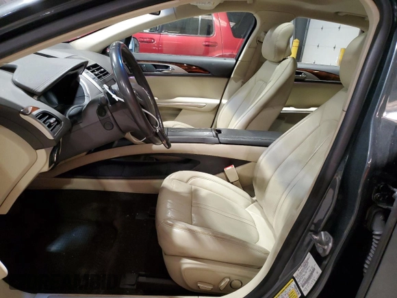 2015 Lincoln MKZ z VIN 3LN6L2J95FR613519, wystawiony jako Copart lot #59165895 z przebiegiem 117 630 mil mil oraz Szkoda całkowita • Salvage title. Historia ofert i sprzedaży dostępna na DreamBid. Obrazek 7.