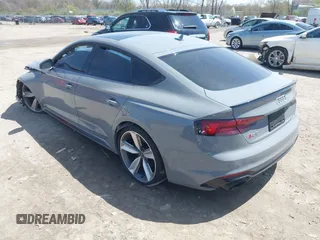 2019 Audi RS 5 Sportback z VIN WUABWCF53KA907286, wystawiony jako IAAI lot #42098943 z przebiegiem 62 275 mil mil oraz . Historia ofert i sprzedaży dostępna na DreamBid. Obrazek 3.