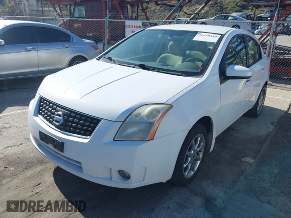 2008 Nissan Sentra S with VIN 3N1AB61EX8L739874, listed as a IAAI auction lot 41950310 with 129,485 mi miles and . Bid and sale history available at DreamBid. Image 2.