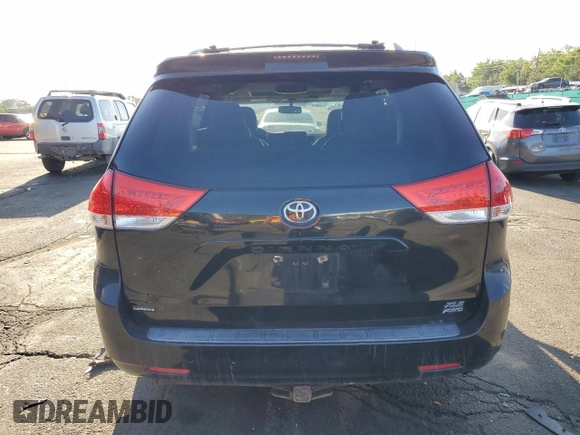 2011 Toyota Sienna XLE with VIN 5TDDK3DC5BS029513, listed as a Copart auction lot 60930395 with 234,226 mi miles and Salvage title. Bid and sale history available at DreamBid. Image 6.
