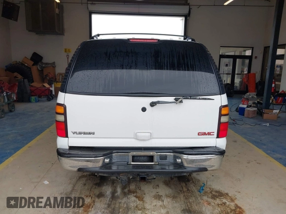 2004 GMC Yukon SLE z VIN 1GKEC13V64R107506, wystawiony jako IAAI lot #41407353 z przebiegiem 215 127 mil mil oraz . Historia ofert i sprzedaży dostępna na DreamBid. Obrazek 16.