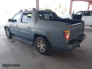 2006 Honda Ridgeline RTL with VIN 2HJYK16516H511027, listed as a IAAI auction lot 42052394 with 354,106 mi miles. Bid and sale history available at carsss.com. Image 3.