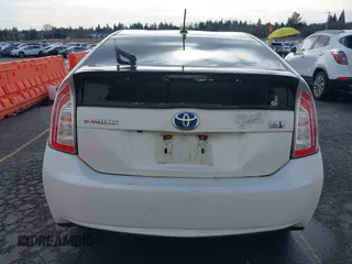 2015 Toyota Prius Four z VIN JTDKN3DU4F1883032, wystawiony jako IAAI lot #41528573 z przebiegiem 104 056 mil mil oraz . Historia ofert i sprzedaży dostępna na DreamBid. Obrazek 16.