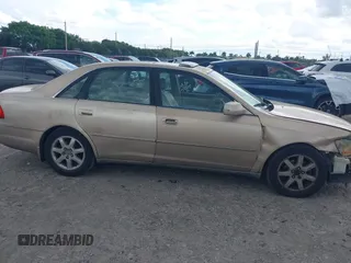 2001 Toyota Avalon XL with VIN 4T1BF28B41U163863, listed as a IAAI auction lot 41679620 with 312,264 mi miles and . Bid and sale history available at DreamBid. Image 14.