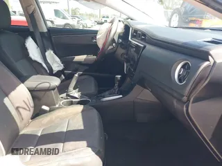 2019 Toyota Corolla L with VIN 5YFBURHE7KP878972, listed as a IAAI auction lot 42000888 with 201,612 mi miles. Bid and sale history available at carsss.com. Image 5.