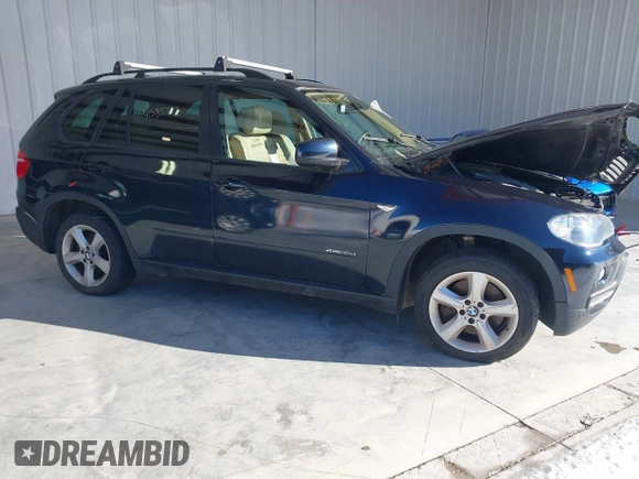 2010 BMW X5 35d with VIN 5UXFF0C50ALJ99887, listed as a IAAI auction lot 41585772 with 96,983 mi miles. Bid and sale history available at carsss.com. Image 1.