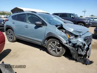 2024 Subaru Crosstrek Premium z VIN JF2GUADC9R8305042, wystawiony jako Copart lot #55796805 z przebiegiem 9 518 mil mil oraz Szkoda całkowita • Salvage title. Historia ofert i sprzedaży dostępna na DreamBid. Obrazek 4.