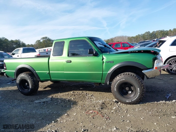 1999 Ford Ranger XLT with VIN 1FTZR15X3XPA13058, listed as a IAAI auction lot 41329263 with 96,926 mi miles. Bid and sale history available at carsss.com. Image 13.