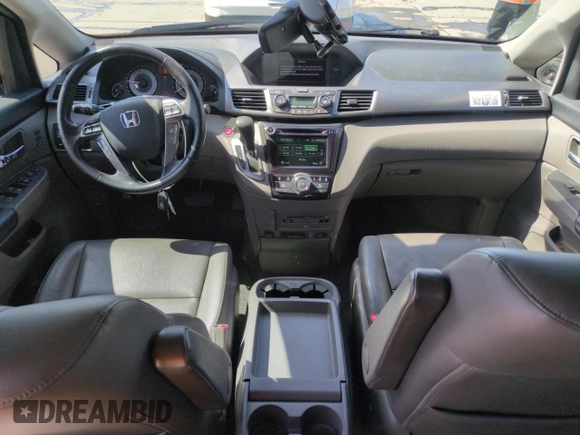 2014 Honda Odyssey Touring with VIN 5FNRL5H95EB052523, listed as a Copart auction lot 52214055 with 131,350 mi miles and Salvage Title. Bid and sale history available at DreamBid. Image 8.
