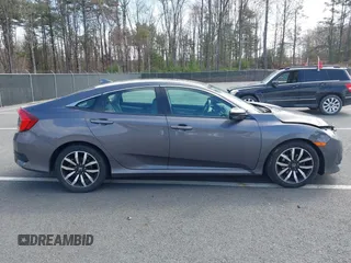 2016 Honda Civic Sedan EX-L with VIN 19XFC1F73GE201419, listed as a IAAI auction lot 42027720 with 168,134 mi miles. Bid and sale history available at carsss.com. Image 13.