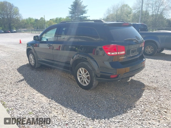 2015 Dodge Journey SXT with VIN 3C4PDCBG2FT560953, listed as a IAAI auction lot 42053264 with 127,463 mi miles and . Bid and sale history available at DreamBid. Image 3.