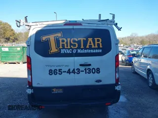 2015 Ford Transit Cargo with VIN 1FTNE1ZM8FKB32441, listed as a IAAI auction lot 41303171 with 203,302 mi miles and . Bid and sale history available at carsss.com. Image 16.