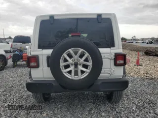 2023 Jeep Wrangler Willys with VIN 1C4HJXDN8PW625204, listed as a Copart auction lot 59328065 with 18,116 mi miles and Salvage title. Bid and sale history available at DreamBid. Image 6.