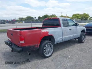 2002 Dodge Dakota Sport with VIN 1B7GL32X82S632091, listed as a IAAI auction lot 42091290 with 206,721 mi miles and . Bid and sale history available at carsss.com. Image 4.