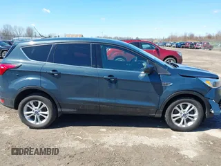 2019 Ford Escape SE z VIN 1FMCU9GDXKUC06609, wystawiony jako IAAI lot #42061974 z przebiegiem 148 064 mil mil oraz . Historia ofert i sprzedaży dostępna na DreamBid. Obrazek 13.