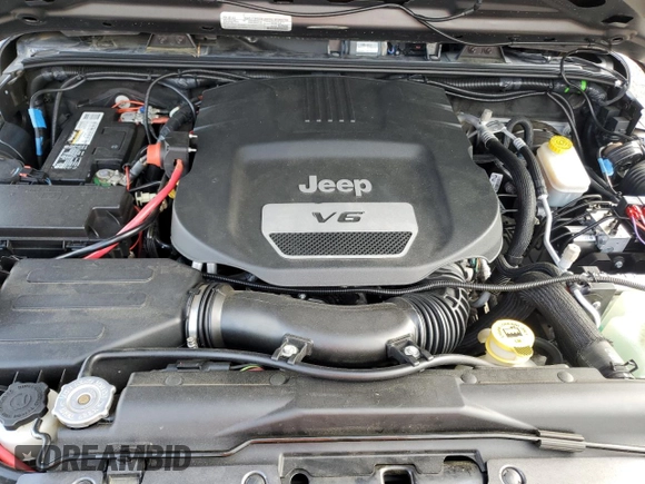 2017 Jeep Wrangler Unlimited Sport with VIN 1C4BJWDG8HL680627, listed as a Copart auction lot 61241735 with 100,890 mi miles and Salvage title. Bid and sale history available at DreamBid. Image 11.