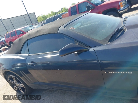 2013 Chevrolet Camaro LT z VIN 2G1FC3D33D9134173, wystawiony jako IAAI lot #41954984 z przebiegiem 157 919 mil mil oraz . Historia ofert i sprzedaży dostępna na DreamBid. Obrazek 13.