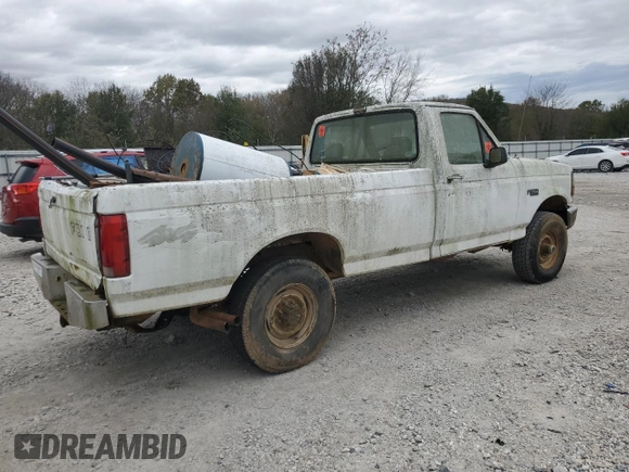 1993 Ford F-250 with VIN 1FTHF26H5PNA11633, listed as a Copart auction lot 79482634 with 186,709 mi miles and Salvage Title. Bid and sale history available at carsss.com. Image 3.