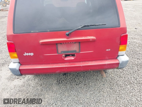 1999 Jeep Cherokee Sport with VIN 1J4FT68S1XL596443, listed as a IAAI auction lot 41767289 with 192,826 mi miles and . Bid and sale history available at DreamBid. Image 6.