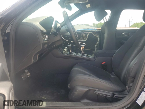 2023 Honda Civic Sport with VIN 2HGFE2F56PH570926, listed as a Copart auction lot 61419145 with 35,014 mi miles and Salvage title. Bid and sale history available at DreamBid. Image 7.