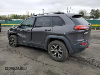 2016 Jeep Cherokee Trailhawk with VIN 1C4PJMBB0GW164437, listed as a Copart auction lot 54776985 with 158,801 mi miles and Salvage title. Bid and sale history available at DreamBid. Image 2.