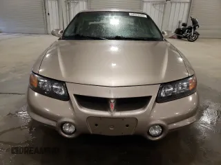 2002 Pontiac Bonneville SLE z VIN 1G2HY54K124211759, wystawiony jako Copart lot #54573555 z przebiegiem 106 409 mil mil oraz Szkoda całkowita • Salvage title. Historia ofert i sprzedaży dostępna na DreamBid. Obrazek 5.