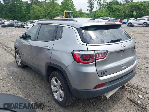 2019 Jeep Compass Latitude with VIN 3C4NJCBB3KT851086, listed as a IAAI auction lot 42248059 with 149,351 mi miles and . Bid and sale history available at DreamBid. Image 3.