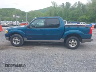 2001 Ford Explorer Sport Trac z VIN 1FMZU77E11UC71161, wystawiony jako IAAI lot #42184342 z przebiegiem 196 240 mil mil oraz . Historia ofert i sprzedaży dostępna na DreamBid. Obrazek 14.