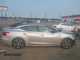 2018 Nissan Maxima SV z VIN 1N4AA6AP1JC366927, wystawiony jako IAAI lot #42394242 z przebiegiem 89 093 mil mil oraz . Historia ofert i sprzedaży dostępna na DreamBid. Obrazek 14.