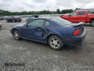 2003 Ford Mustang Standard with VIN 1FAFP40453F452999, listed as a Copart auction lot 57884325 with 135,463 mi miles and Salvage title. Bid and sale history available at DreamBid. Image 2.