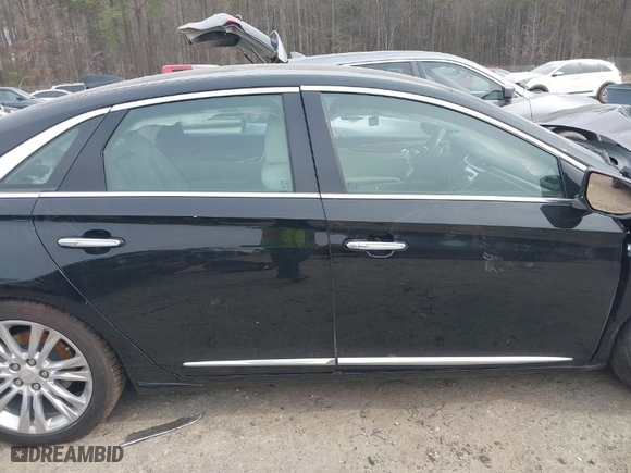 2019 Cadillac XTS Luxury with VIN 2G61M5S38K9152522, listed as a IAAI auction lot 41670026 with NaN miles. Bid and sale history available at carsss.com. Image 13.