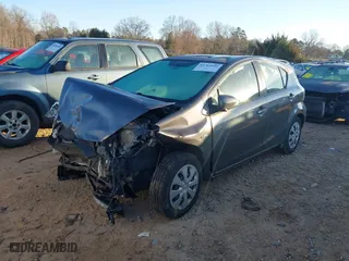2014 Toyota Prius c One with VIN JTDKDTB33E1570372, listed as a IAAI auction lot 41763352 with 118,713 mi miles. Bid and sale history available at carsss.com. Image 17.