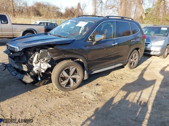 2019 Subaru Forester Touring with VIN JF2SKAWC5KH403102, listed as a IAAI auction lot 41768976 with 73,851 mi miles. Bid and sale history available at carsss.com. Image 20.