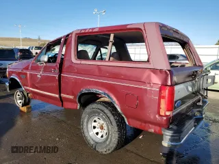 1996 Ford Bronco Custom with VIN 1FMEU15HXTLA00505, listed as a Copart auction lot 48621395 with 178,614 mi miles and Salvage Title. Bid and sale history available at DreamBid. Image 2.