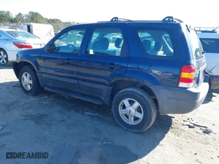 2003 Ford Escape XLS Popular with VIN 1FMYU02133KA02990, listed as a IAAI auction lot 41803174 with 140,792 mi miles. Bid and sale history available at carsss.com. Image 3.