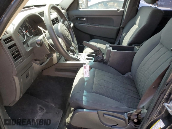 2011 Jeep Liberty Sport with VIN 1J4PN2GK9BW570298, listed as a Copart auction lot 53944155 with 99,511 mi miles and Salvage Title. Bid and sale history available at DreamBid. Image 7.