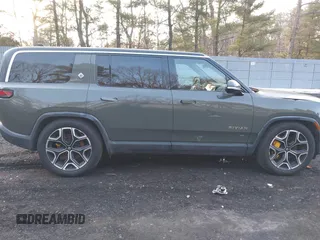 2022 Rivian R1S Launch Edition with VIN 7PDSGABL4NN000409, listed as a IAAI auction lot 41433164 with 39,603 mi miles. Bid and sale history available at carsss.com. Image 13.