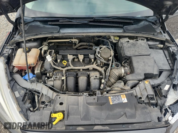2016 Ford Focus SE z VIN 1FADP3F28GL267618, wystawiony jako Copart lot #58920765 z przebiegiem 157 980 mil mil oraz Szkoda całkowita • Salvage title. Historia ofert i sprzedaży dostępna na DreamBid. Obrazek 11.