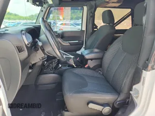 2016 Jeep Wrangler Black Bear with VIN 1C4AJWAG5GL151537, listed as a Copart auction lot 62665455 with 93,537 mi miles and Salvage title. Bid and sale history available at DreamBid. Image 7.