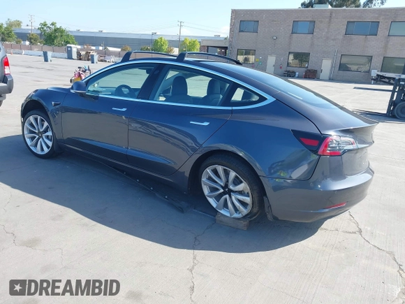 2018 Tesla Model 3 Long Range Battery with VIN 5YJ3E1EA4JF024102, listed as a IAAI auction lot 42100621 with 86,298 mi miles and . Bid and sale history available at DreamBid. Image 3.