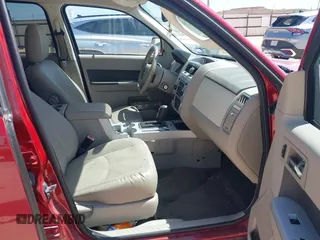 2011 Mercury Mariner Premier with VIN 4M2CN8HG3BKJ08774, listed as a IAAI auction lot 42007038 with 127,551 mi miles and . Bid and sale history available at DreamBid. Image 5.